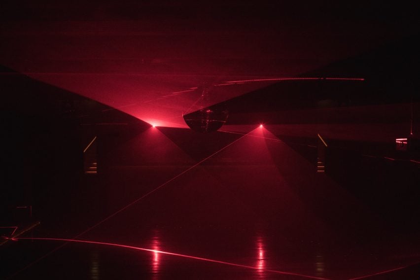 Dark night club with red laser lighting