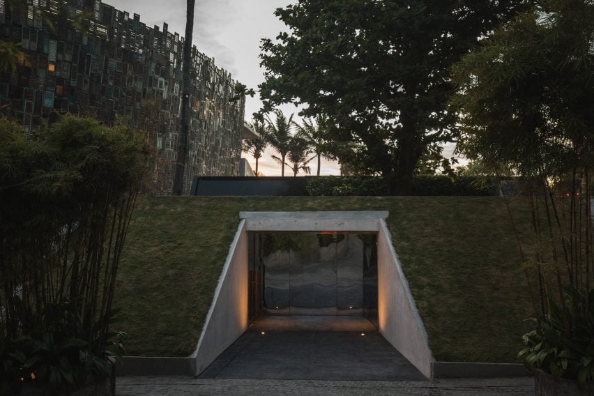 Entrance to the night club as if from a bunker