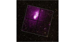 A purple cluster of galaxies can be seen in space.  The white box indicates the main area.