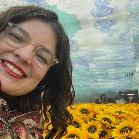 A candid photo or selfie of Jess Perriam in a field of sunflowers