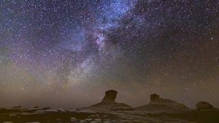 Beautiful starry night sky over the desert landscape in the White Desert.  Egypt