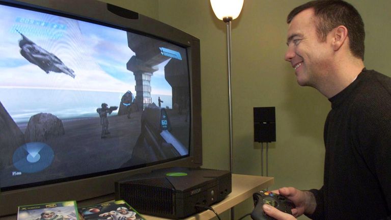 Microsoft's Peter Parsons demonstrates an Xbox and a video game "Halo" On December 4, 2001, his company announced that the Xbox was the best-selling video game console in history after selling more than 556,000 units in its first two weeks, according to The NDP Group, an independent source of sales and market data in video game industry.  Gamers also buy 2.4 Xbox games with every console unit sold, leading to the highest game connection rate ever recorded for a console.