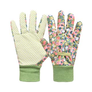 a pair of gardening gloves.  One side is cream with green polka dots and a green wrist band and the other side is floral with a green wrist band