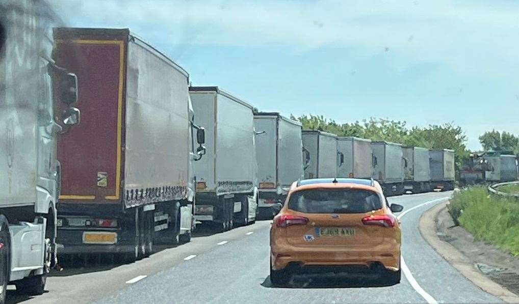 Dover TAP in operation on the A20, with lorries queuing in the left lane of the dual carriageway.  Image: Sussex beds