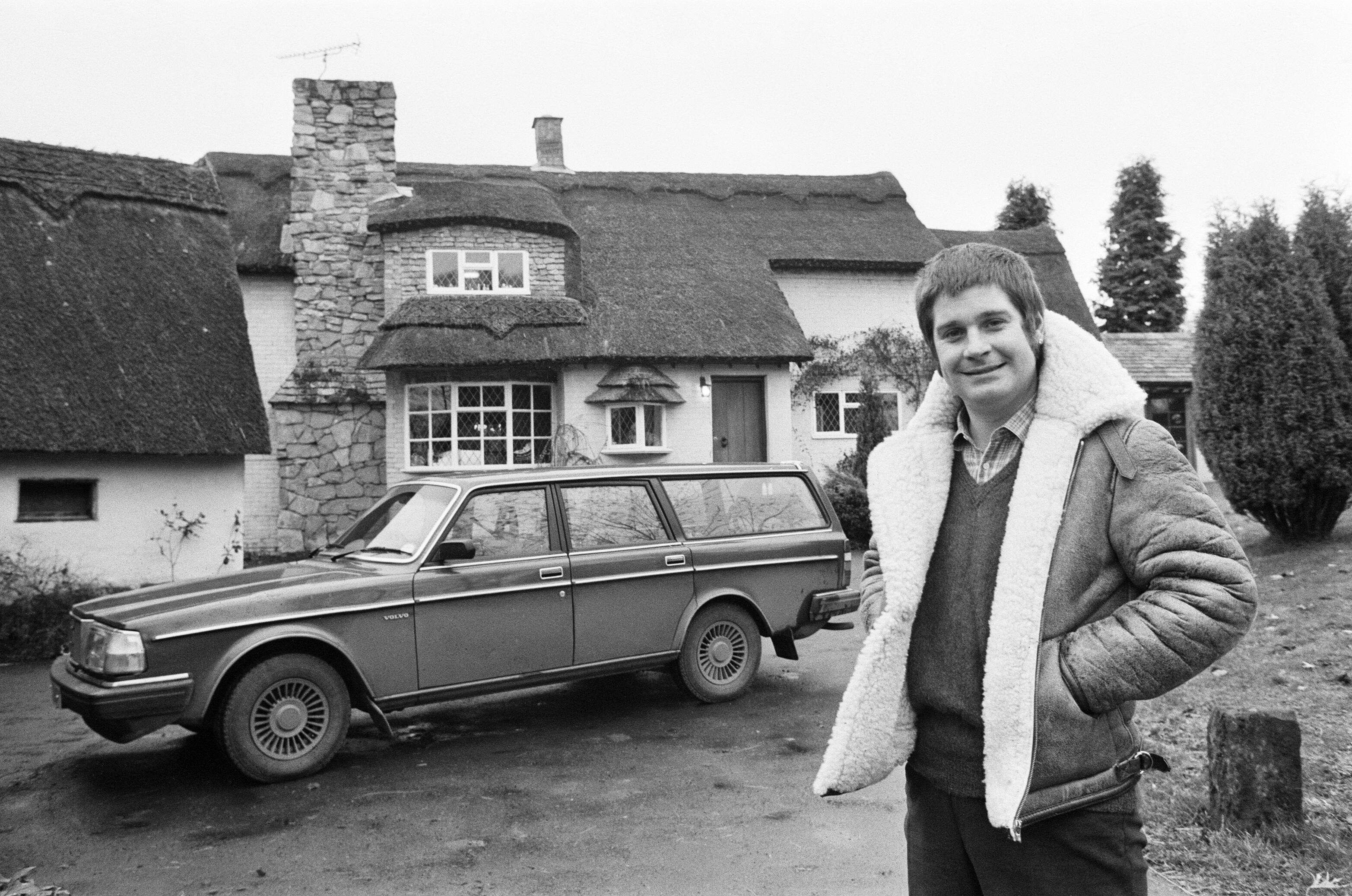 Black Sabbath singer Ozzy Osbourne with his Volvo in 1982