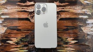 Apple iPhone 15 Pro Max in front of a stalactite photo