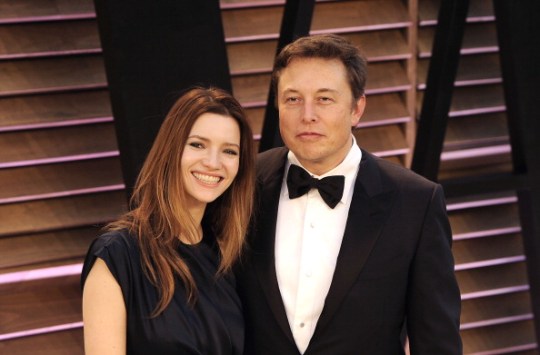 Actress Talulah Riley (left) and Tesla Motors CEO Elon Musk arrive at the 2014 Vanity Fair Oscar Party on March 2, 2014 