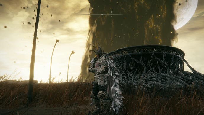 Elden Ring Shadow of the Erdtree screenshot showing the player character brooding next to a giant stone chalice