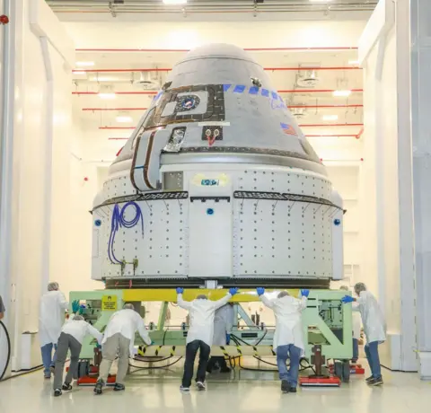 Boeing Starliner is pushed by engineers