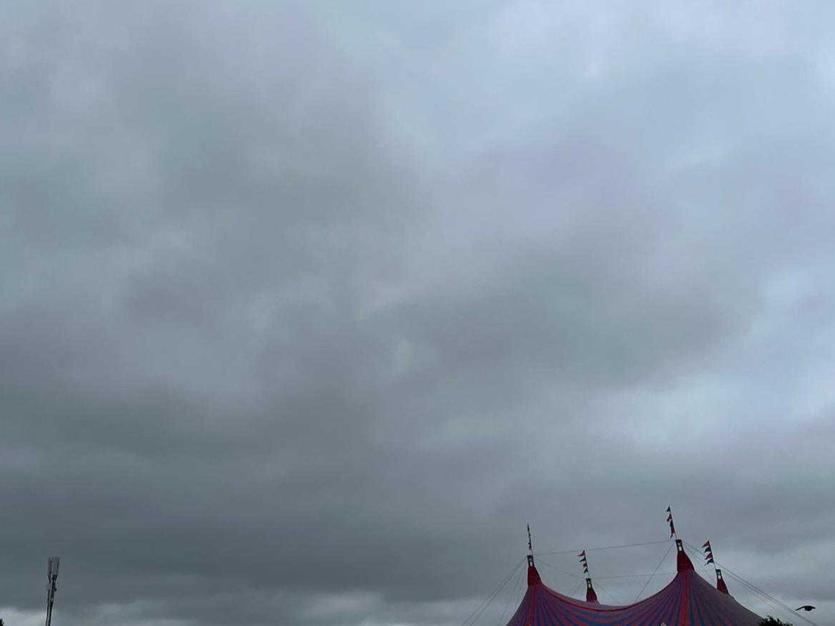 Dark clouds are gathering over Glastonbury on Friday morning