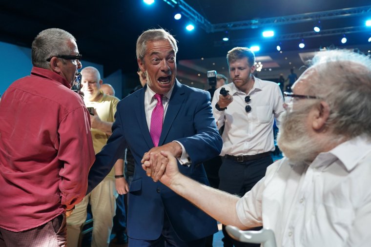 SUNDERLAND, ENGLAND - JUNE 27: UK reform leader Nigel Farage greets supporters during a campaign rally at the Rainton Arena in Houghton-le-Spring on June 27, 2024 in Sunderland, United Kingdom.  According to the latest polling figures, Reform UK is predicted to win 14% of the vote on July 4.  Election Day is a week away and the leader of Reform UK is campaigning in the North East.  (Photo: Ian Forsyth/Getty Images) *** BESTPIX ***