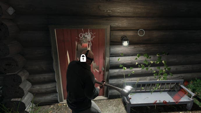 Jason swings his ax at the cabin door on Friday the 13th