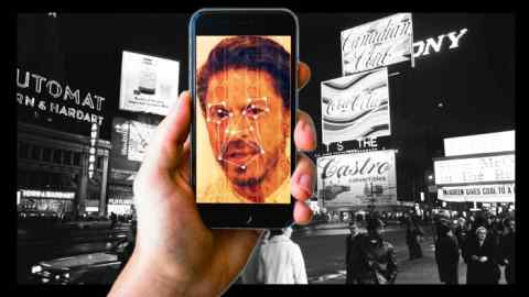 Bollywood star Shah Rukh Khan is the face of an AI-powered Cadbury ad that can be customized by small shops across India.  Also a picture of an advertisement in Times Square, New York in 1970