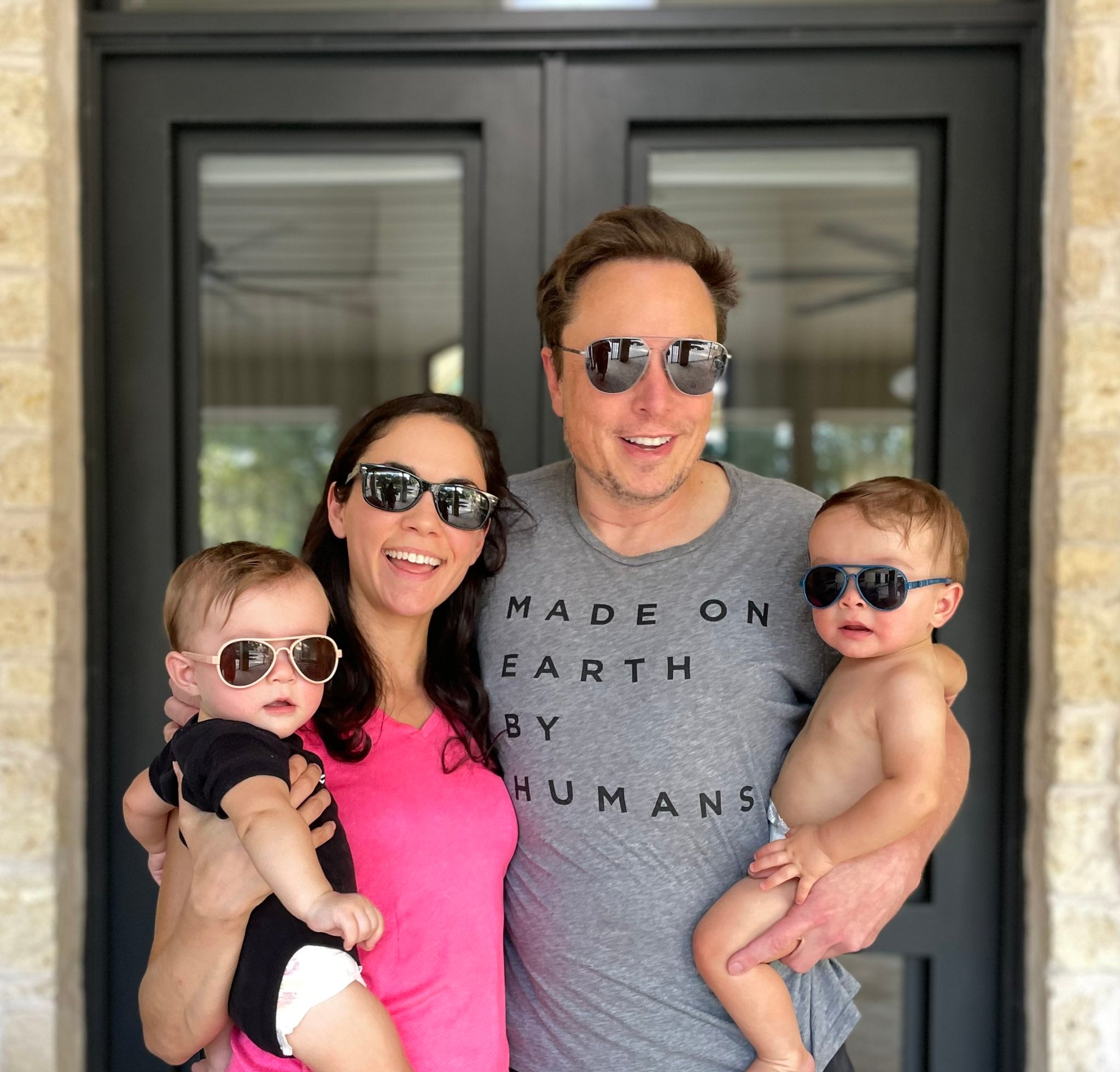 Elon Musk, Shivon Zilis and their twins.  Musk announced that the couple welcomed a new child earlier this year