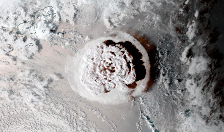 Satellite image showing a huge cloud rising from a volcanic eruption.