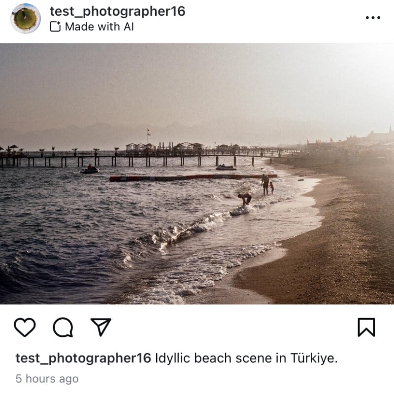 Tranquil beach scene in Türkiye with gentle waves lapping against the shore and a few people enjoying the water.  A long jetty stretches out to sea and the horizon is hazy and the sun casts a soft golden glow over the landscape.