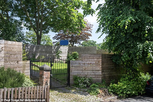 He didn't ask the city council's planners for permission and when they heard what he had done they ordered him to take it all down, causing outrage from his neighbours.