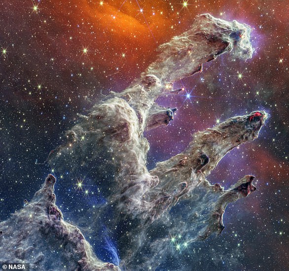 The creature's ghostly hand-like pillars are part of the Eagle Nebula - which is 6,500 light-years away from Earth - and are known to be the source of star formation.