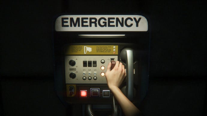 Ripley's places the key card in the marked machine "Emergency" to save the game.