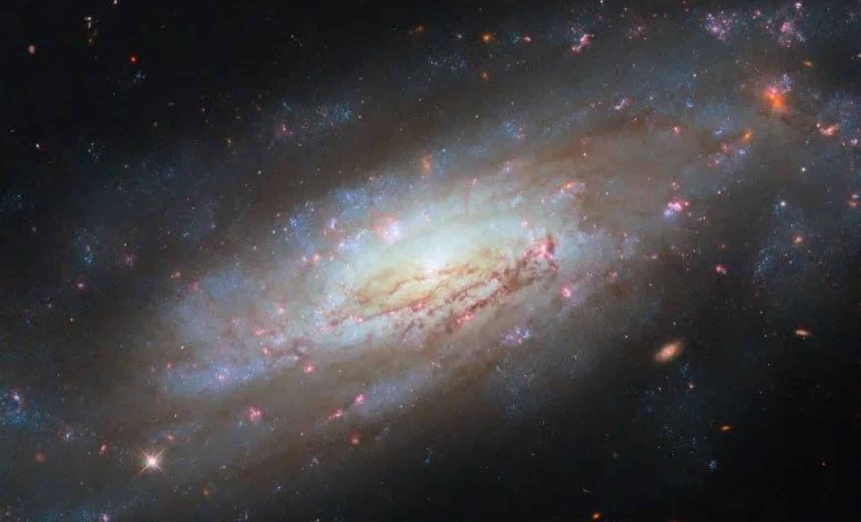 Hubble has captured stunning detail of the dynamic spiral galaxy Ngc 4951