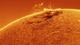 A solar flare on the surface of the sun.