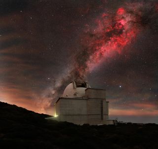 Isaac Newton's telescope under the swan gas clouds.