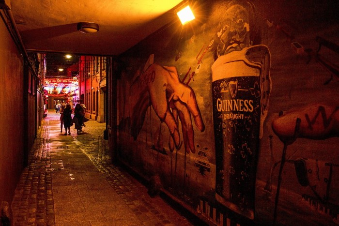 A mural in Belfast, Northern Ireland depicting a pint of Guinness