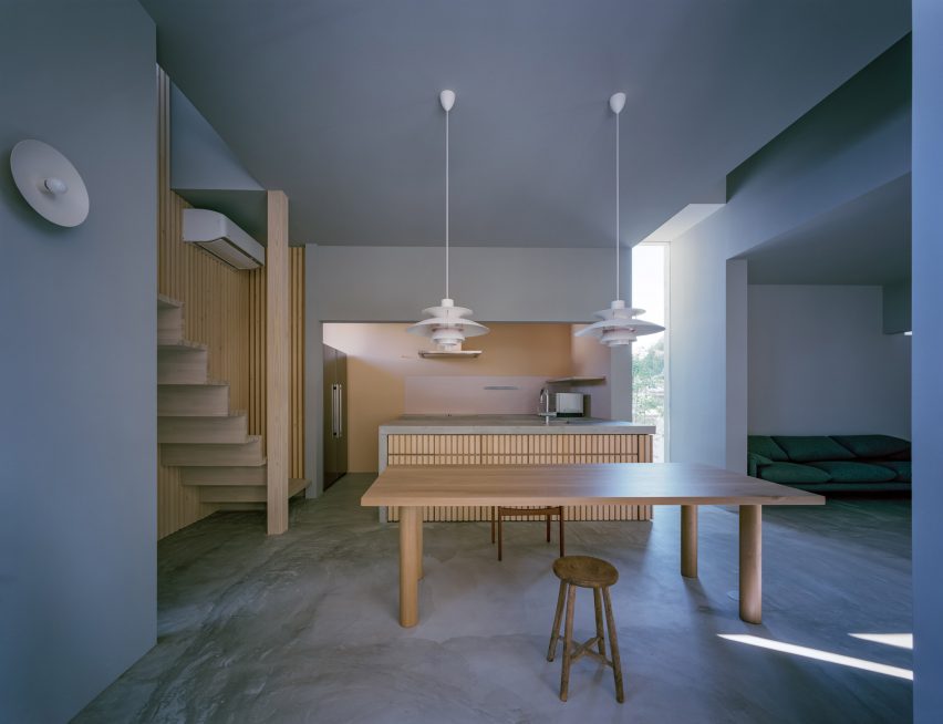 Kitchen with gray walls and wooden furniture