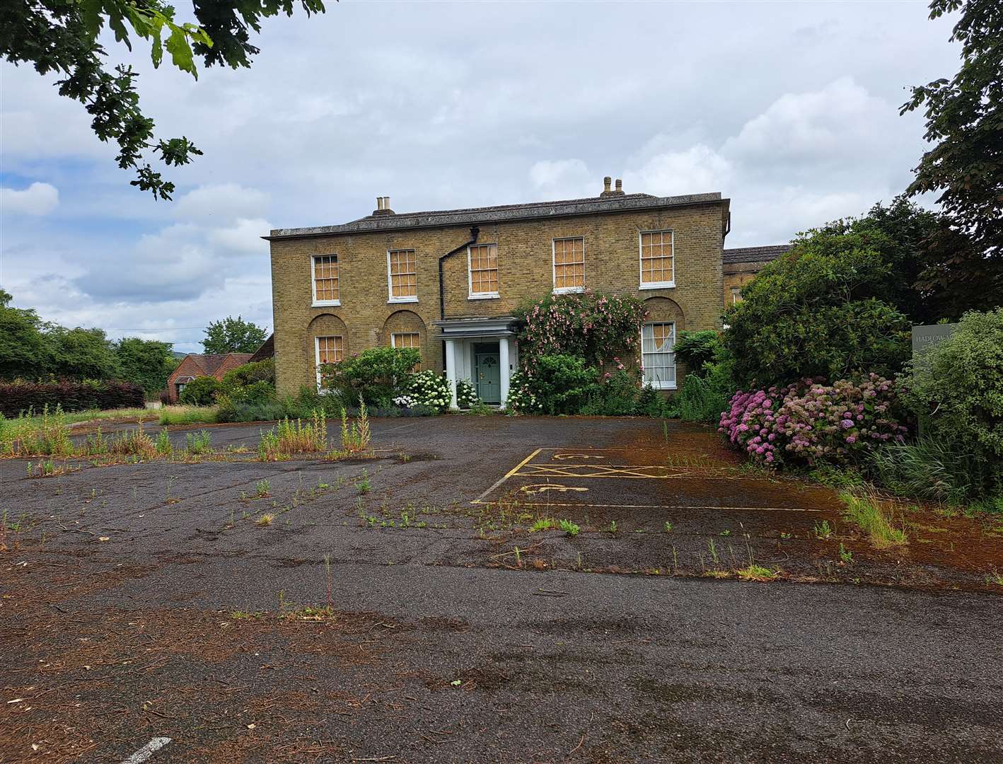 The rather sad looking Georgian facade of the Hadlow Manor Hotel