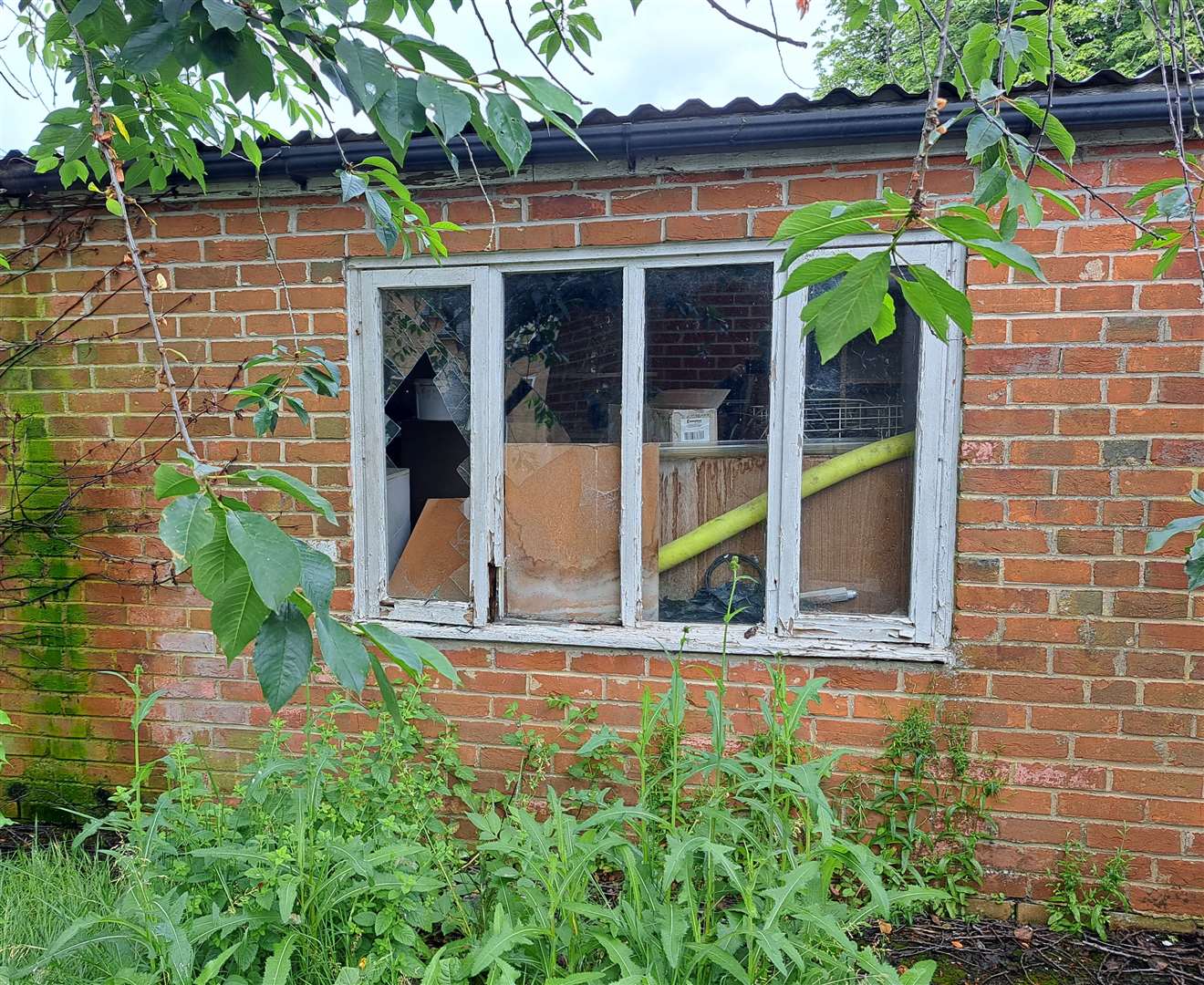 Vandals smashed windows in the outbuildings of the Hadlow Manor Hotel