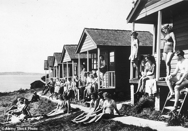 Guests outside the cottages at Pontins Holiday Camp, Osmington Bay, Dorset, in 1958