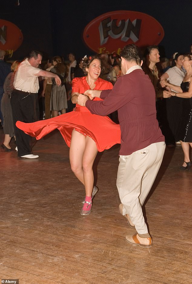 A man and woman take to the dance floor during Pontins 'Rhythm Riot Weekend' at the now closed Camber Sands venue in Sussex