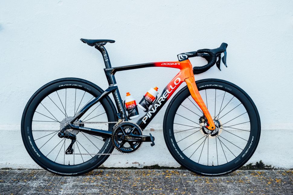 orange, red and black pinarello road bike