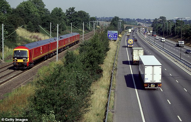 A Royal Mail train pictured speeding past Watford Gap on a southbound service to the Princess Royal Mail terminal at Willesden